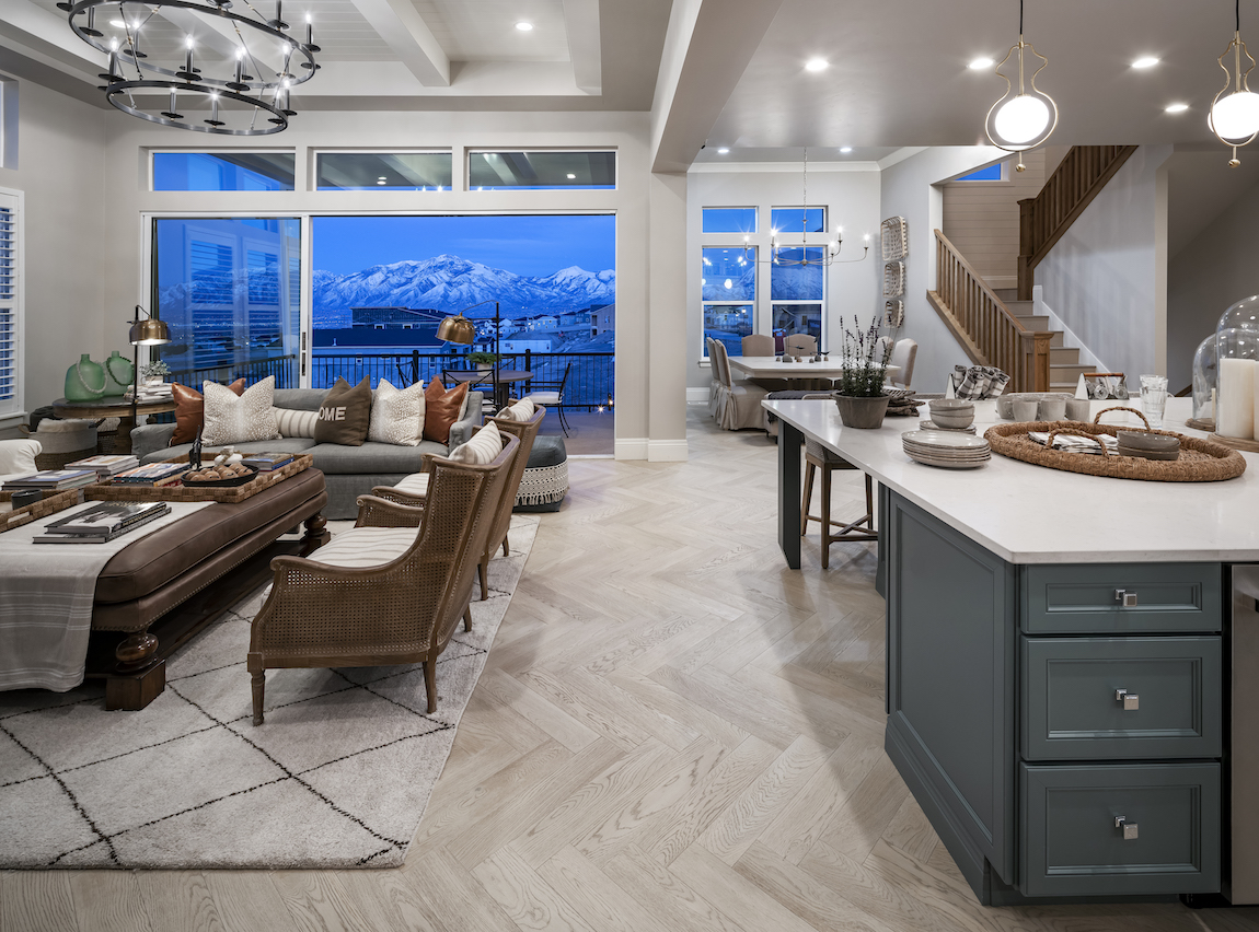 View of Rocky Mountains from the inside of a Toll Brothers model home at Toll Brothers at Rosecrest. 