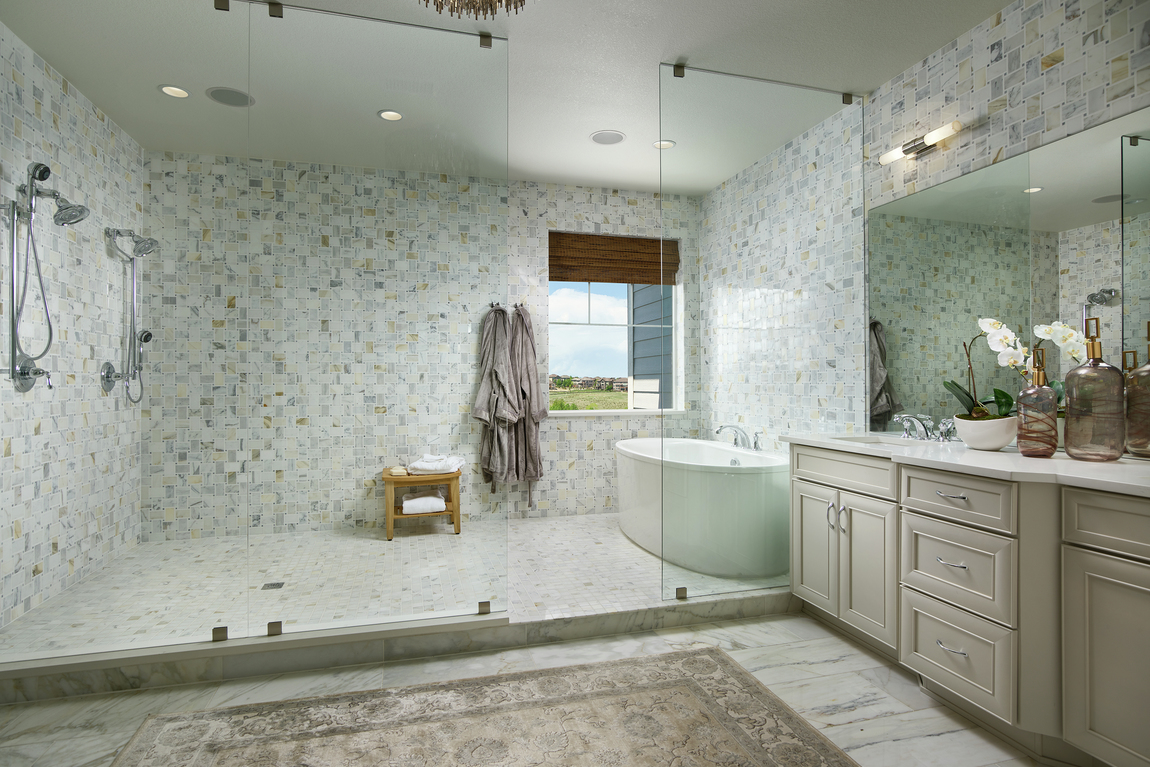 Master bathroom with pleasing, warm tile design