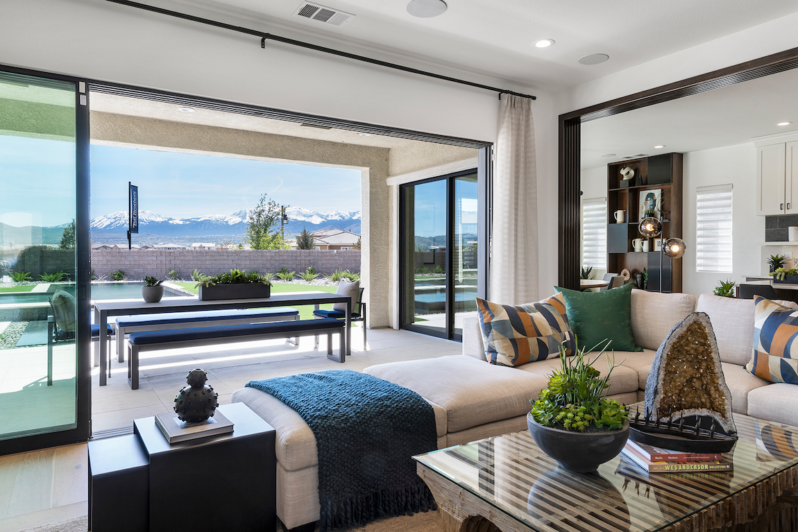 Indoor-outdoor living space in Nevada with views of snow capped mountains.