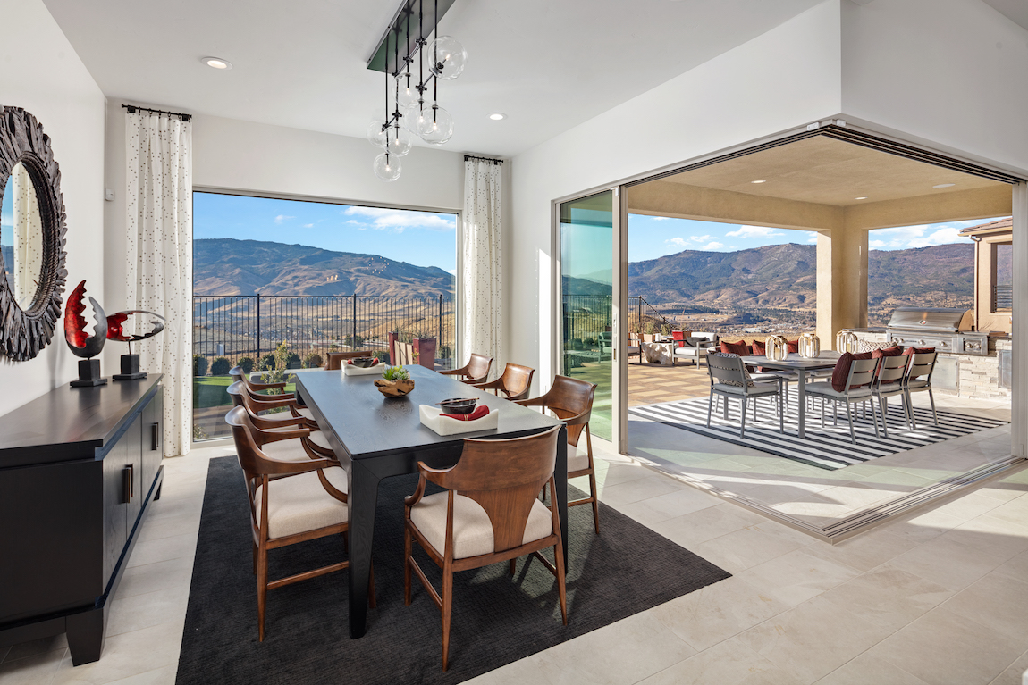 Outdoor living space in a luxury Toll Brothers home overlooking Nevada mountains.