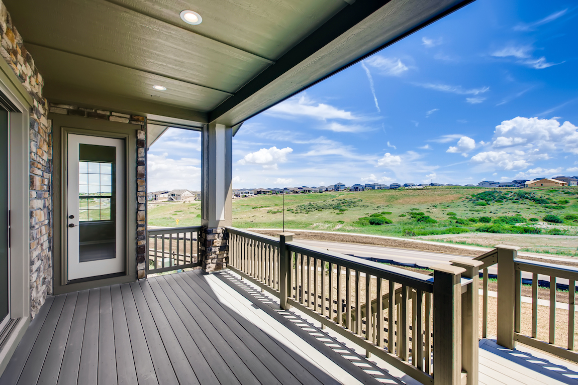 View of open space from a patio in Toll Brothers at Inspiration community.