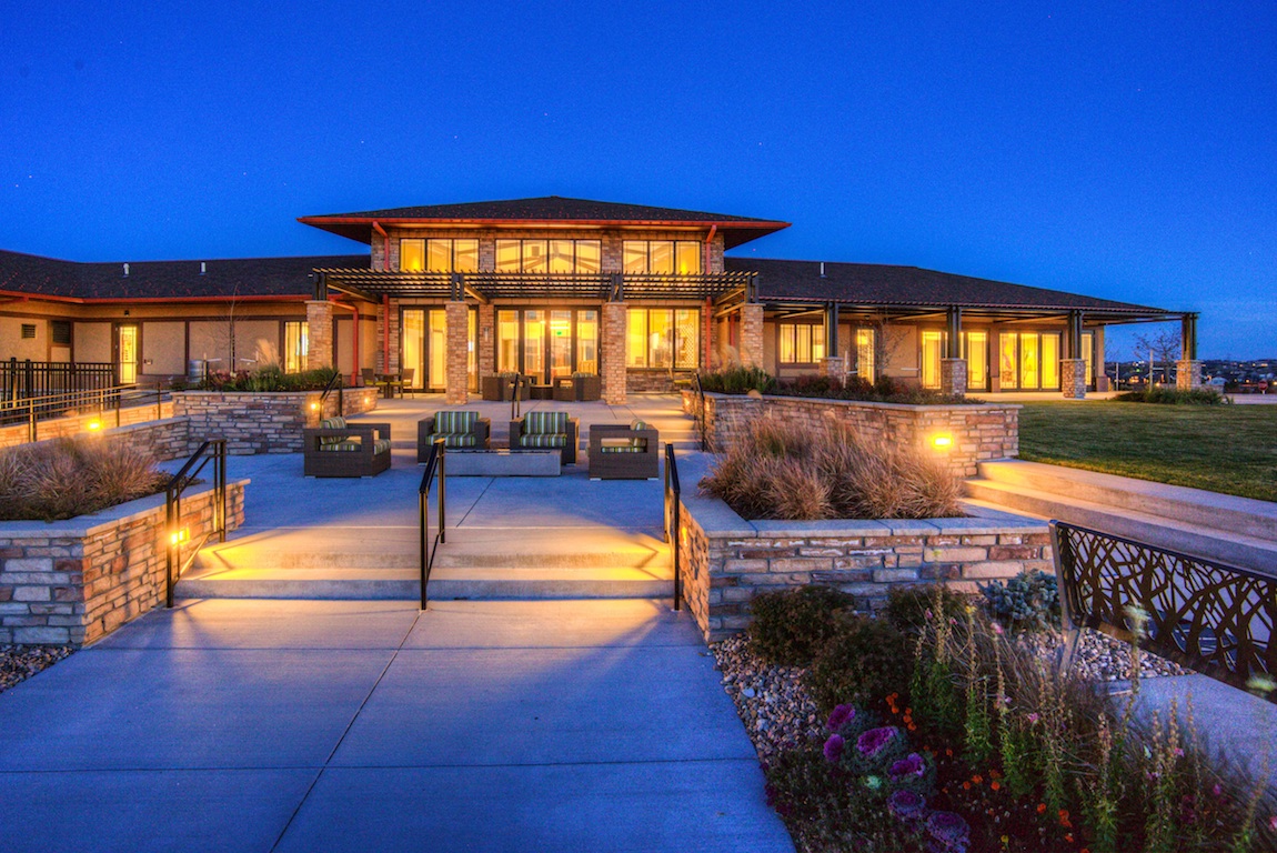 View of clubhouse during dusk at the Toll Brothers at Inspiration community.