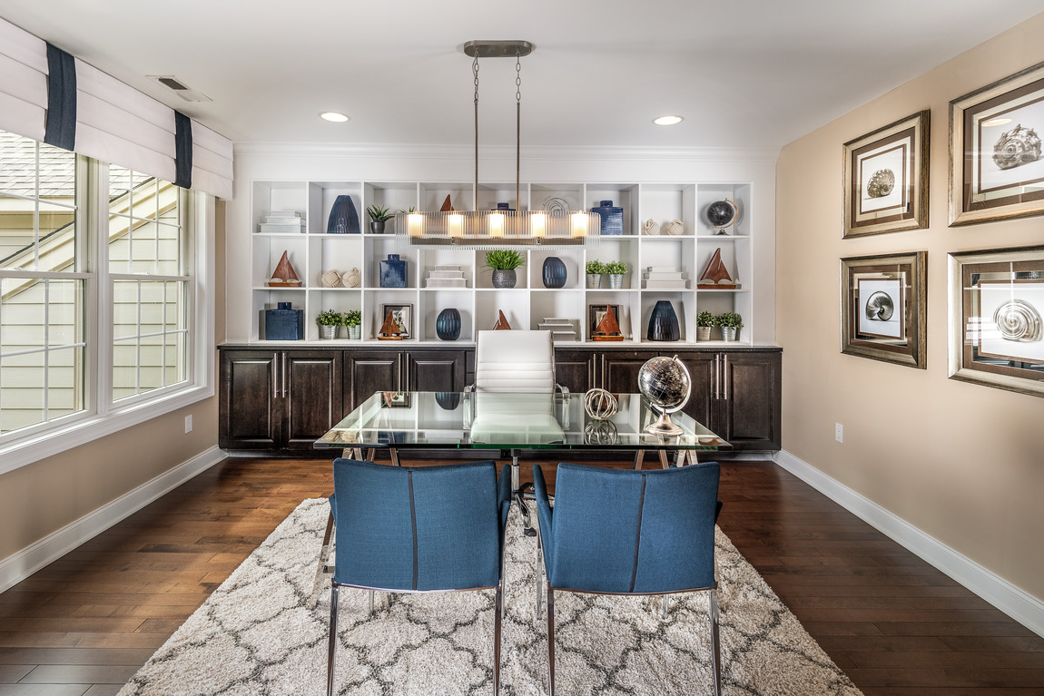 Spacious office with built-in shelving