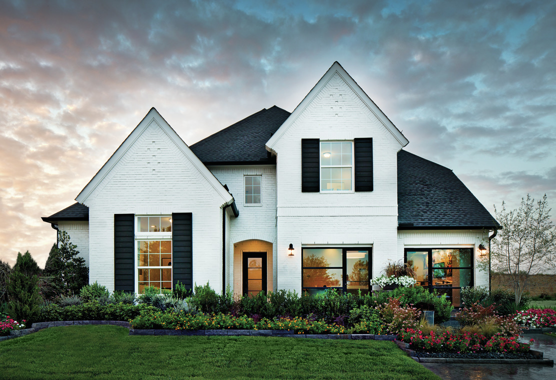 Exterior of a new construction Toll Brothers Longview model home in Dallas Forth Worth
