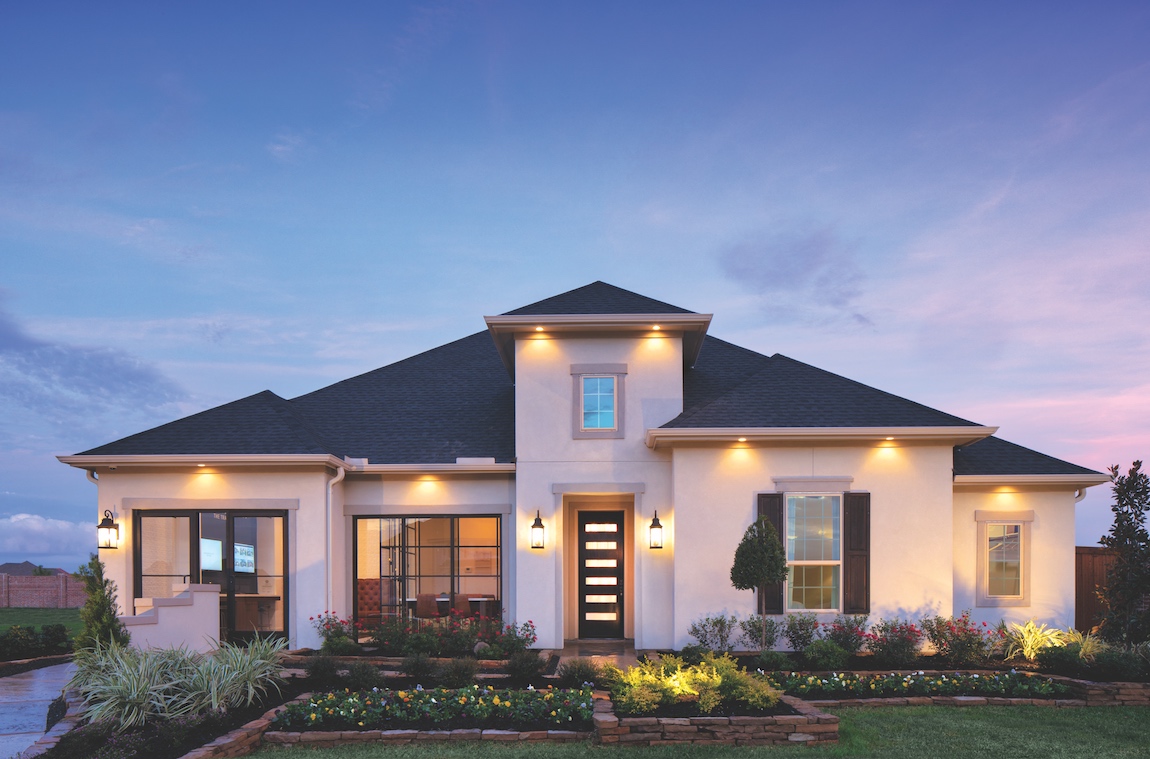 Exterior of a new construction Toll Brothers Loralai model home in Dallas Forth Worth