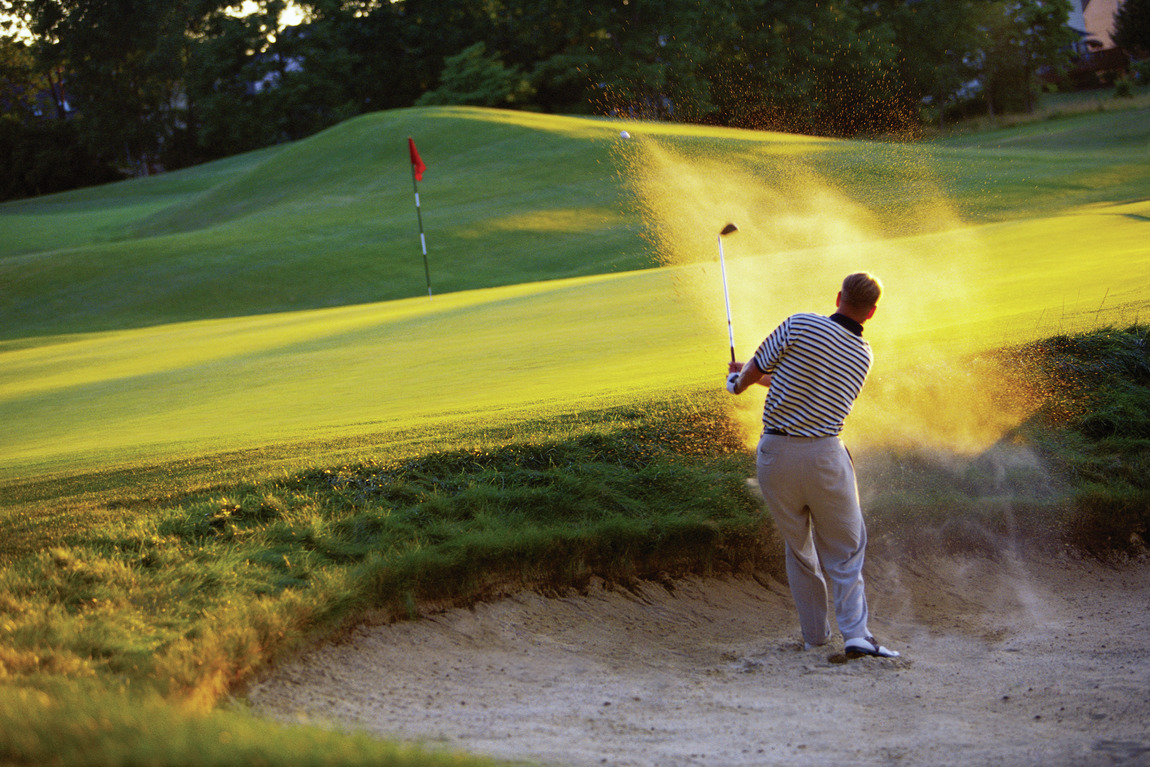 Man playing golf