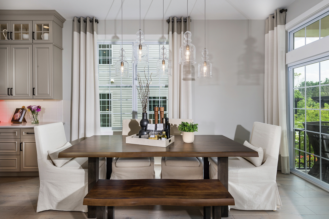 Modern breakfast area with industrial lighting