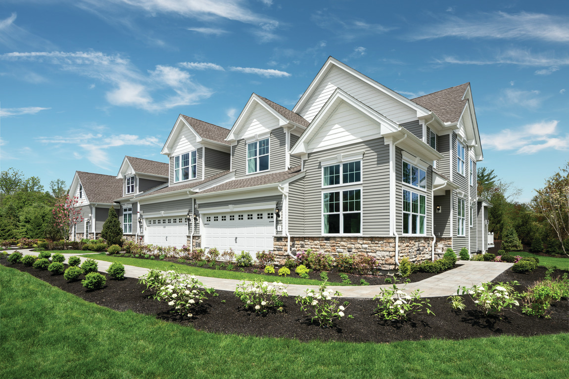 Exterior of a new construction Toll Brothers Bucknell Manor model home in Massachusetts 