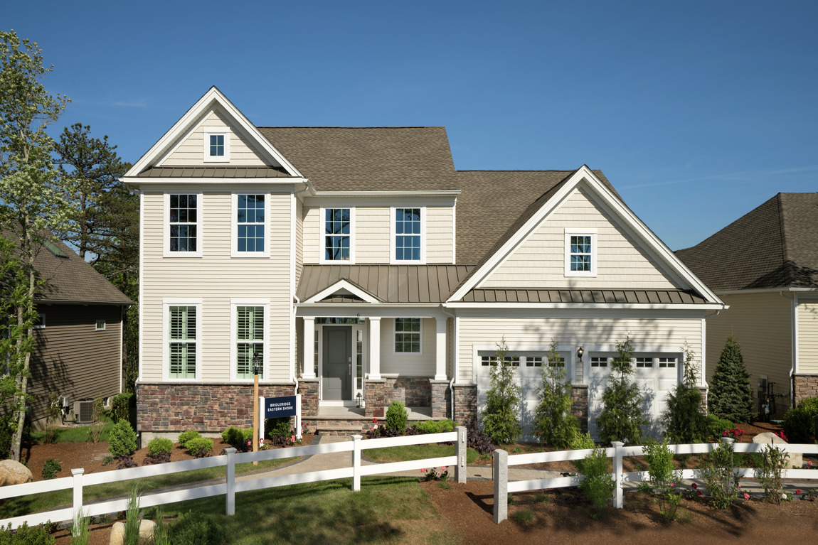 Exterior of a new construction Toll Brothers Bridleridge model home in Massachusetts 