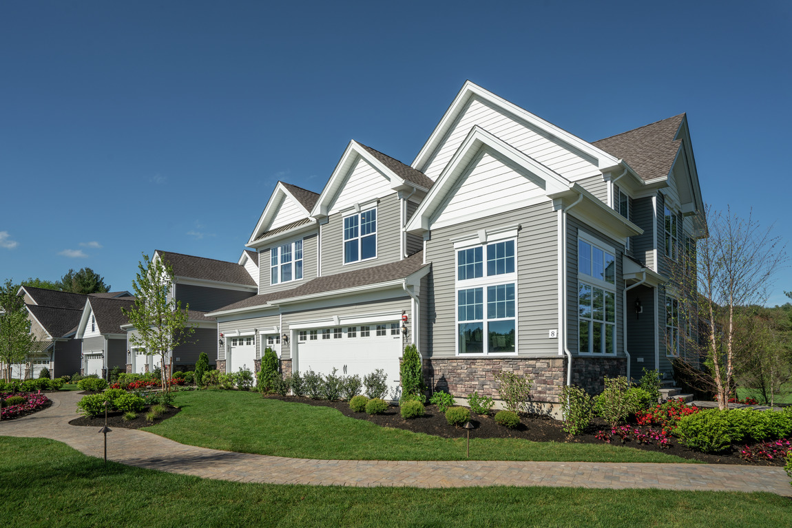 Exterior of a new construction Toll Brothers Kington model home in Massachusetts 