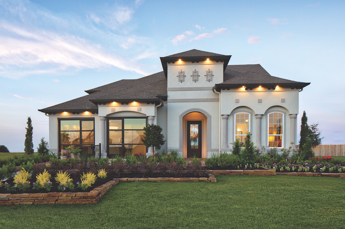 Exterior of a new construction Toll Brothers Juniper model home in Dallas Forth Worth