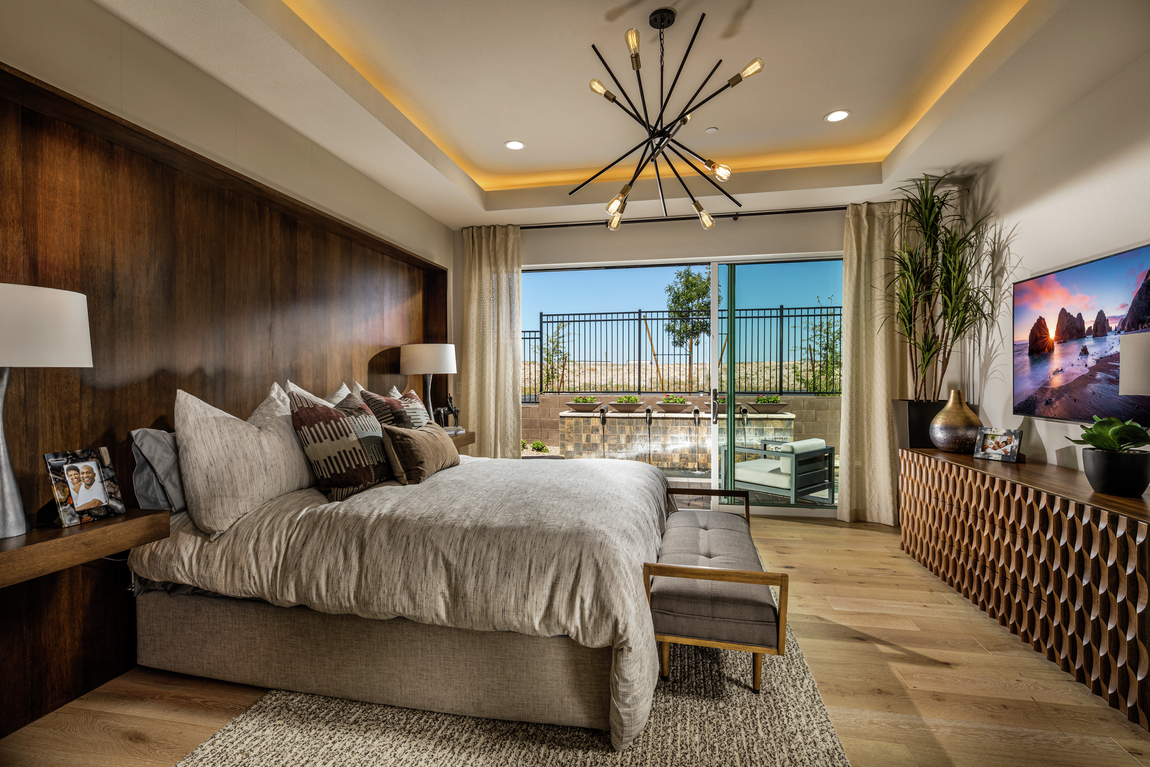 Luxe bedroom highlighted by accent lighting