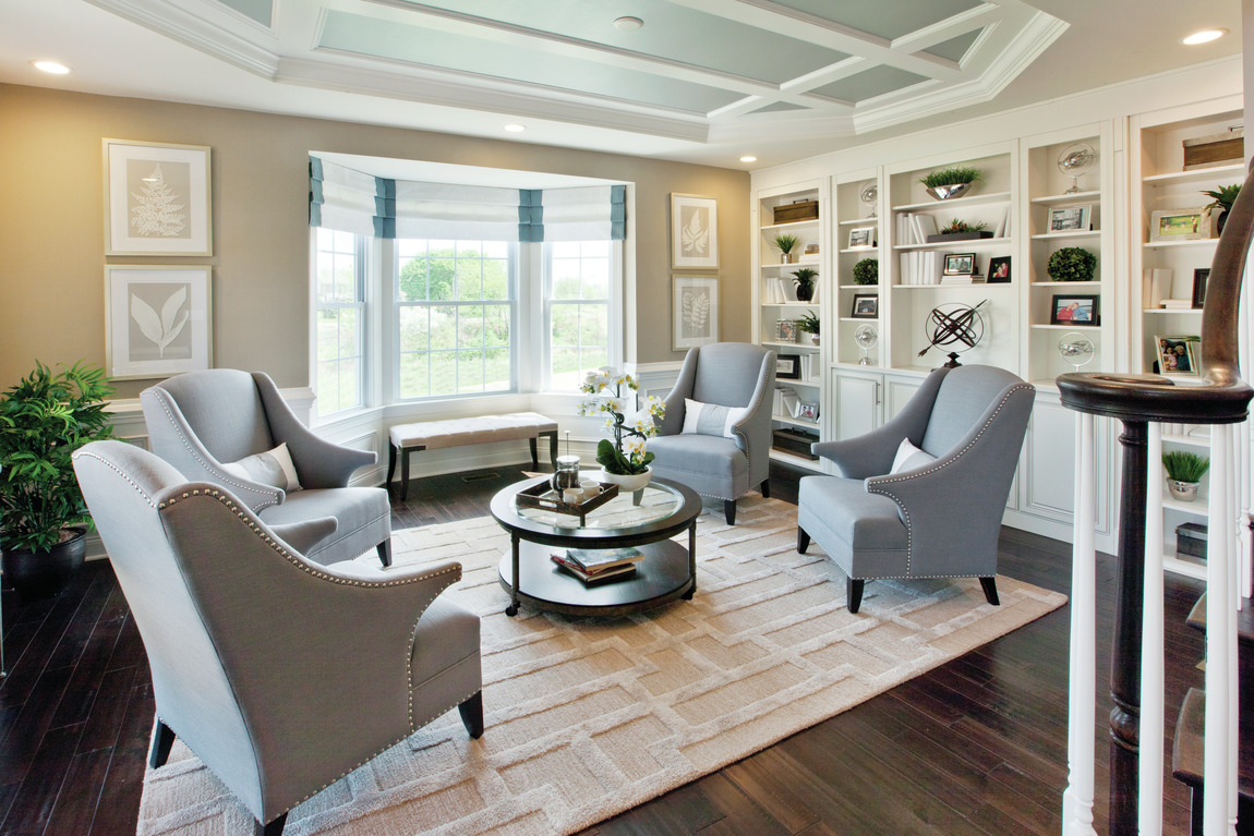 Modern home library with plenty of seating
