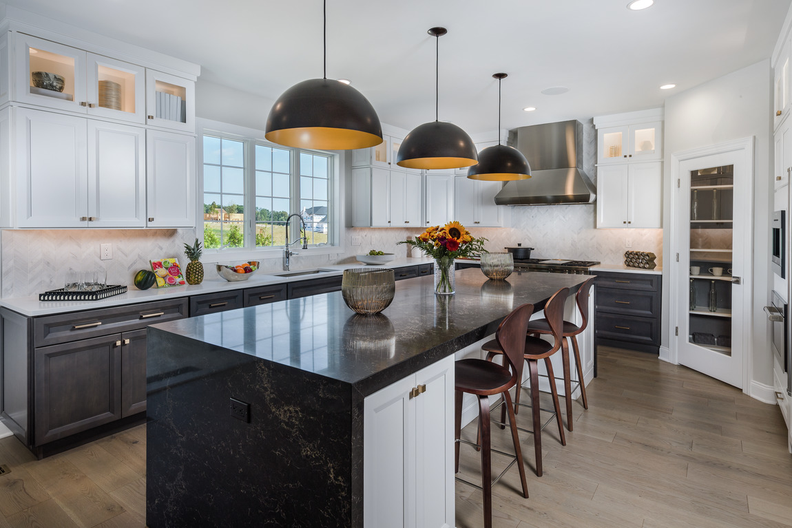 Spacious kitchen with spectacular pendant lighting