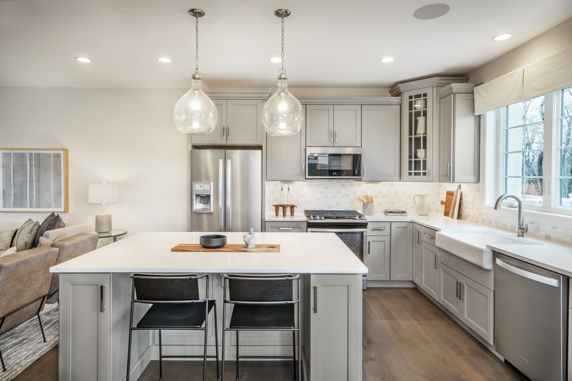 Simple kitchen with sleek island and seating