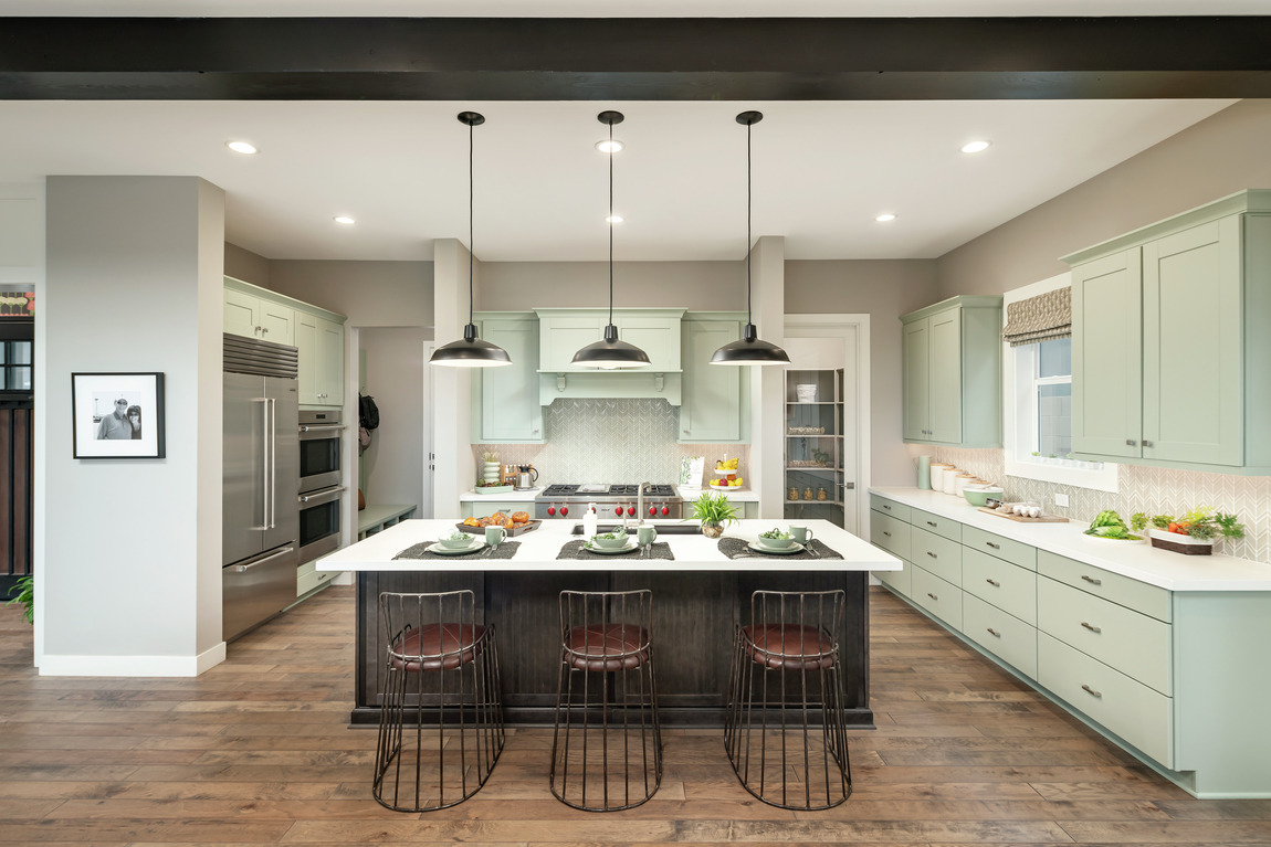 Modern farmhouse kitchen design with quartz countertops.