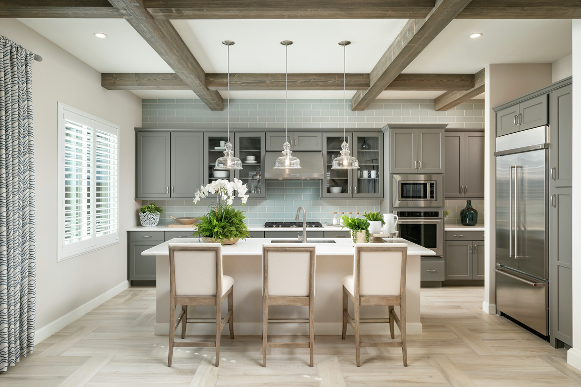 Luxury kitchen highlighted by a beam ceiling.