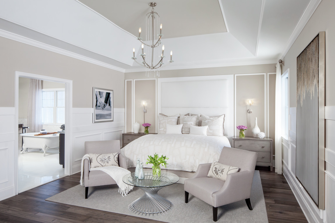 A primary bedroom with a romantic design that features floral patterns.