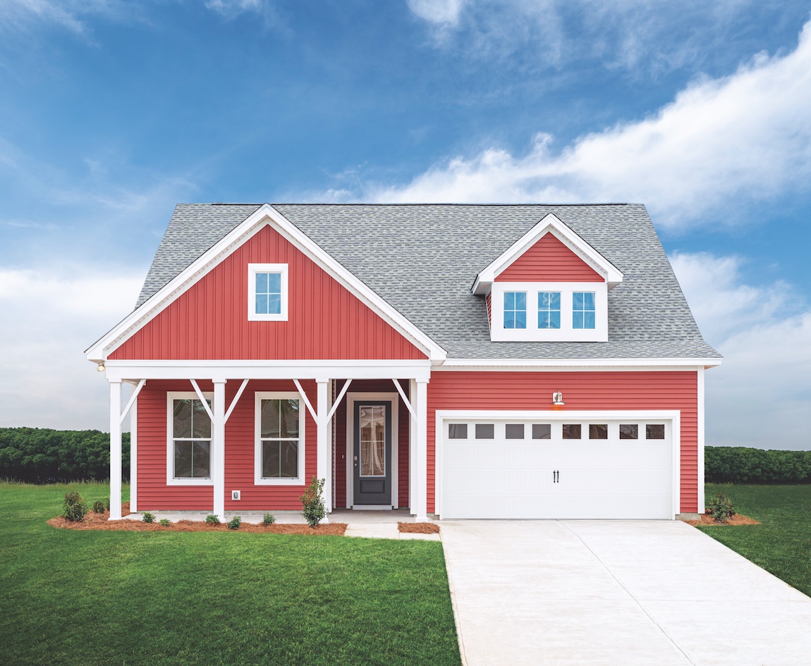 A craftsman design with a white and red exterior home color combination.