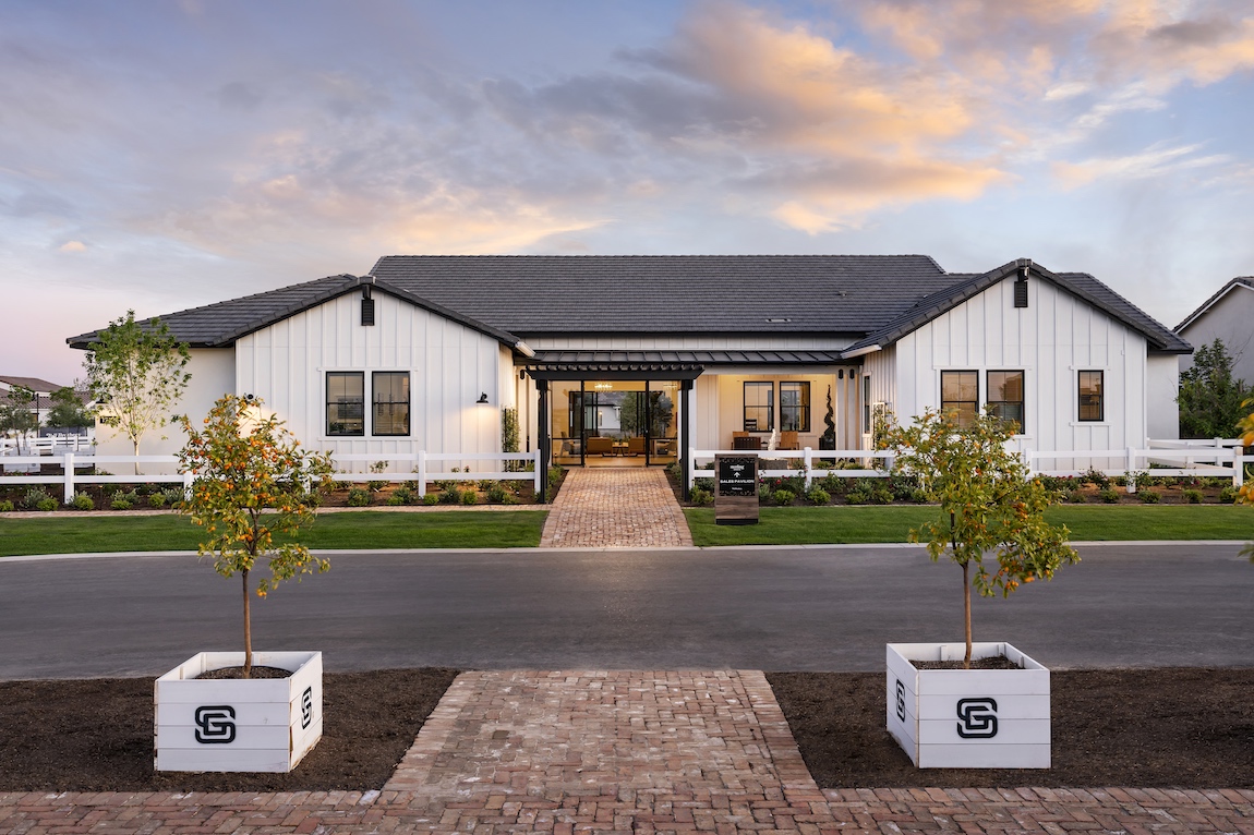 Exterior of a luxury home in Arizona with soft exterior lighting. 