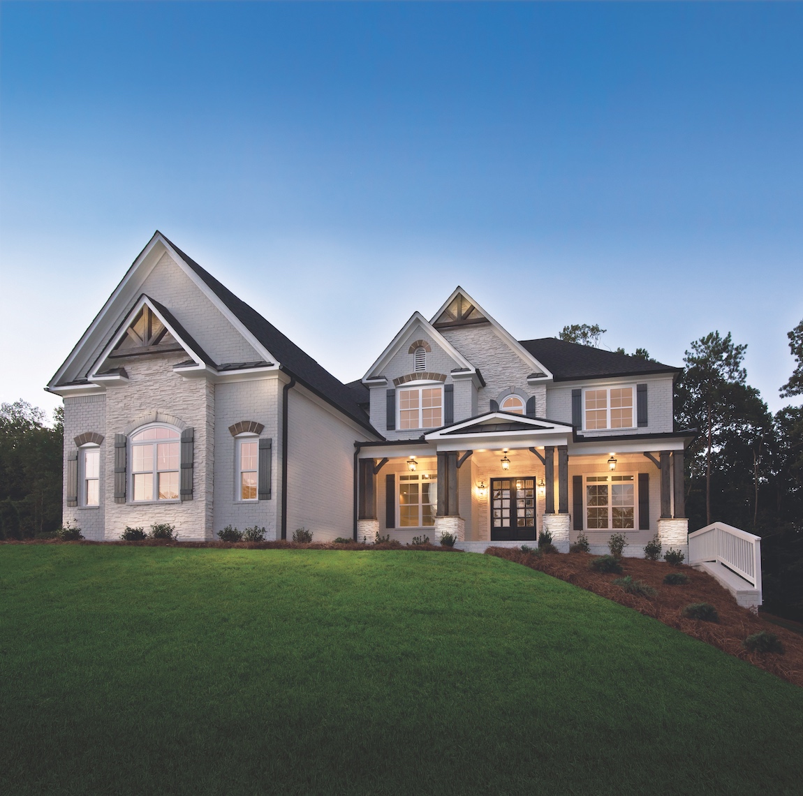 Toll Brothers model home in Georgia with porch lighting.