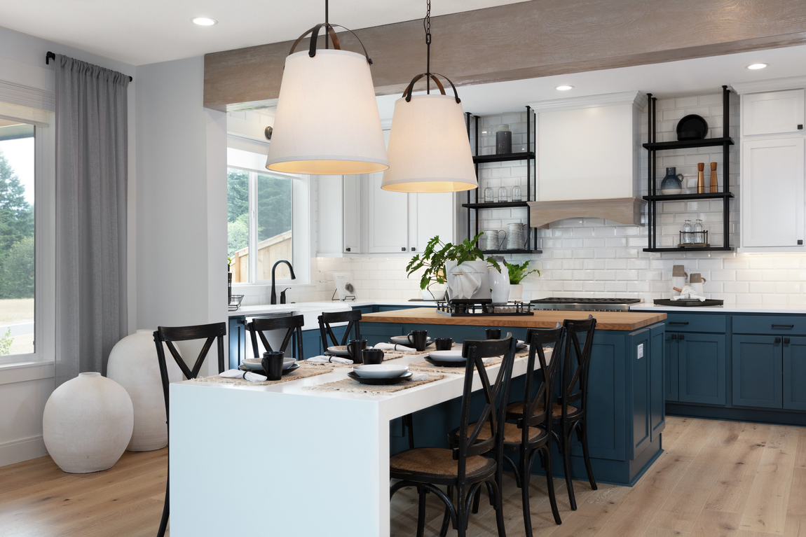 Modern kitchen featuring quartz and butcher block island design