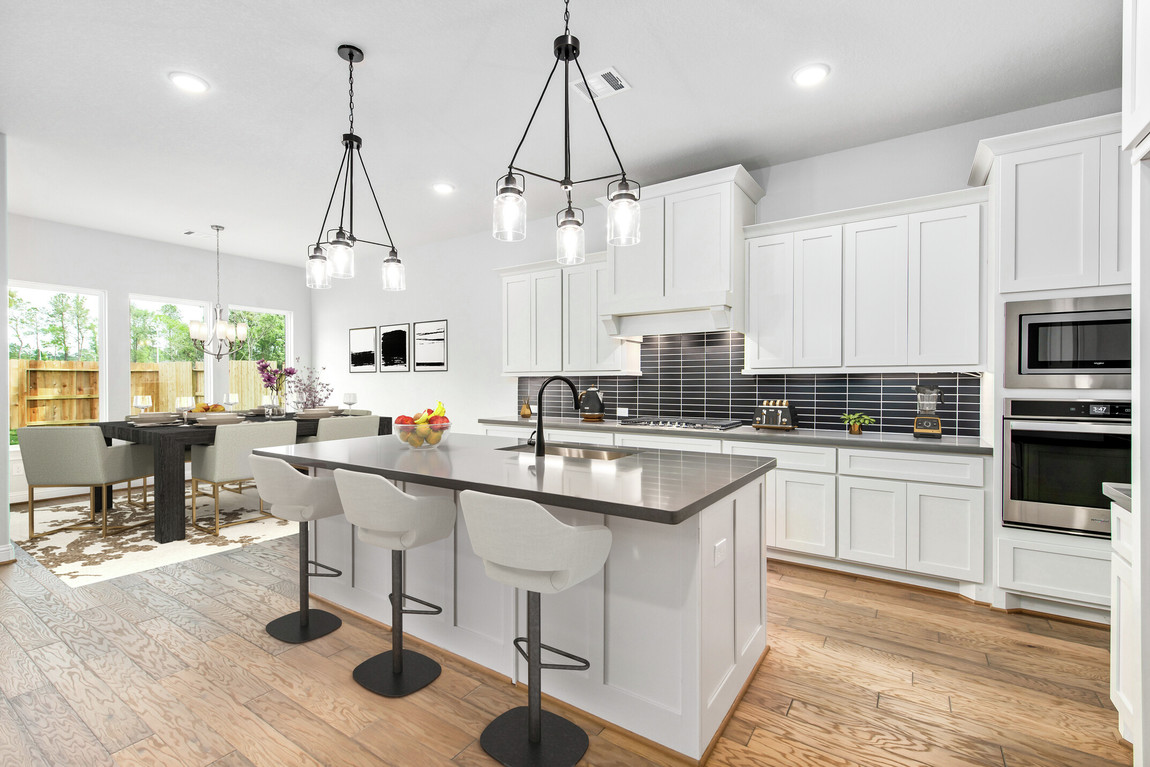 Kitchen featuring subway tile design