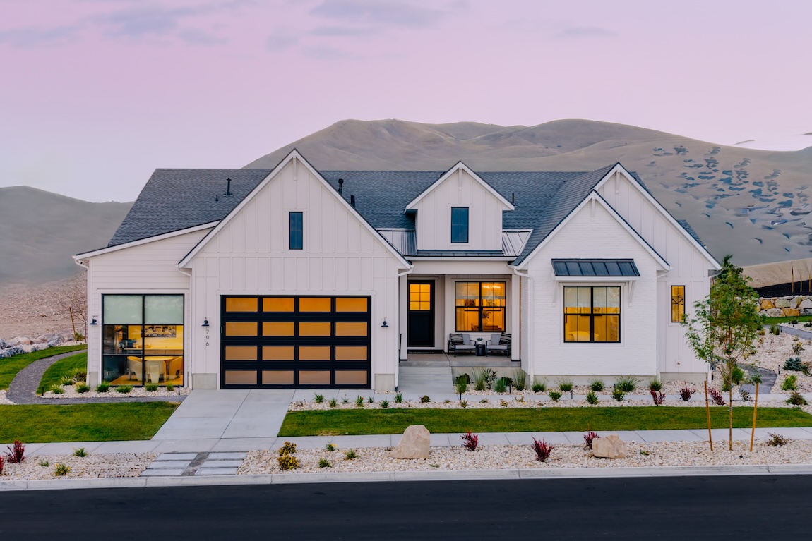 modern exterior of home with backdrop of the mountains