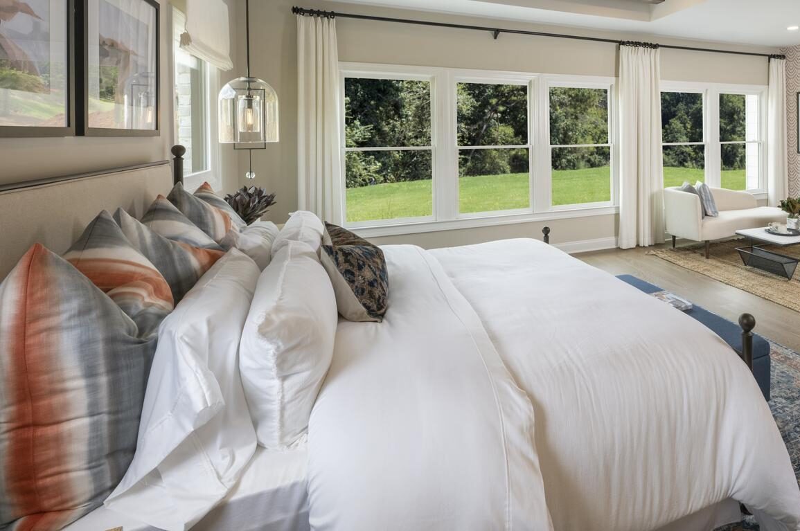 Primary bedroom with suite style seating