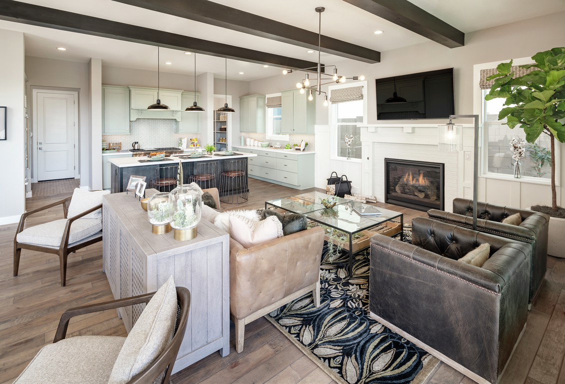 Rustic style great room with wood beams.