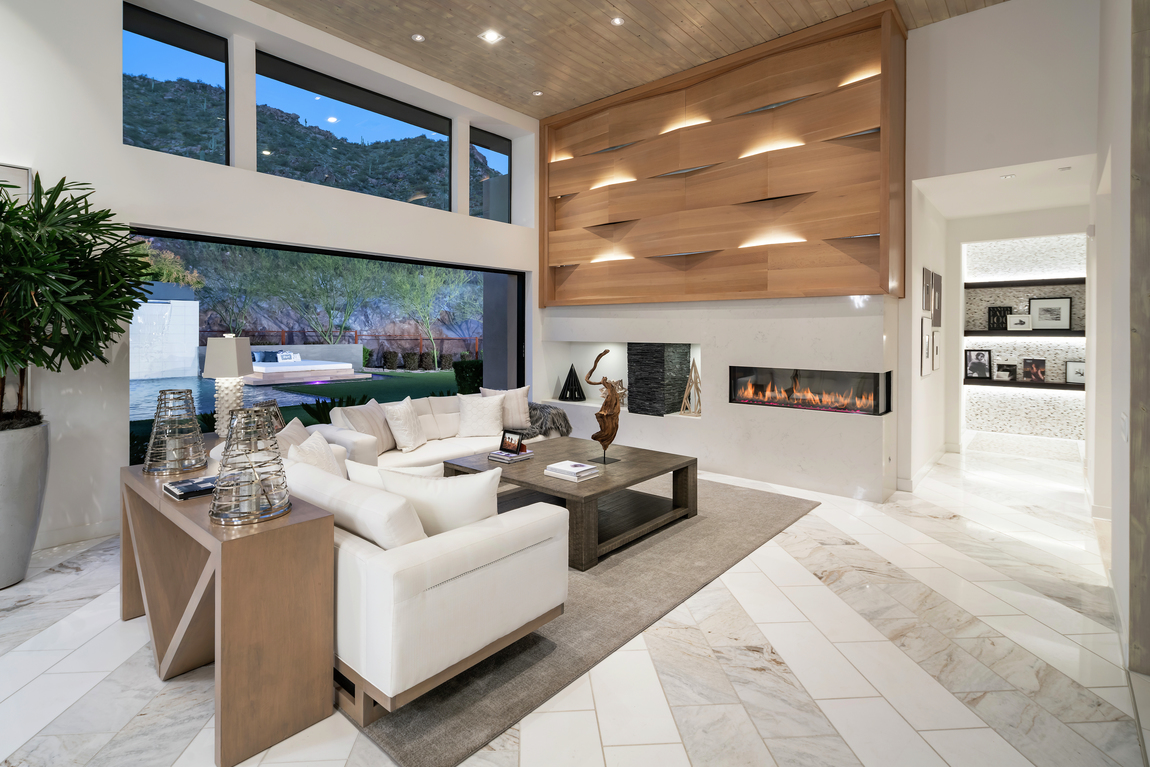 Minimalist modern great room with linear fireplace