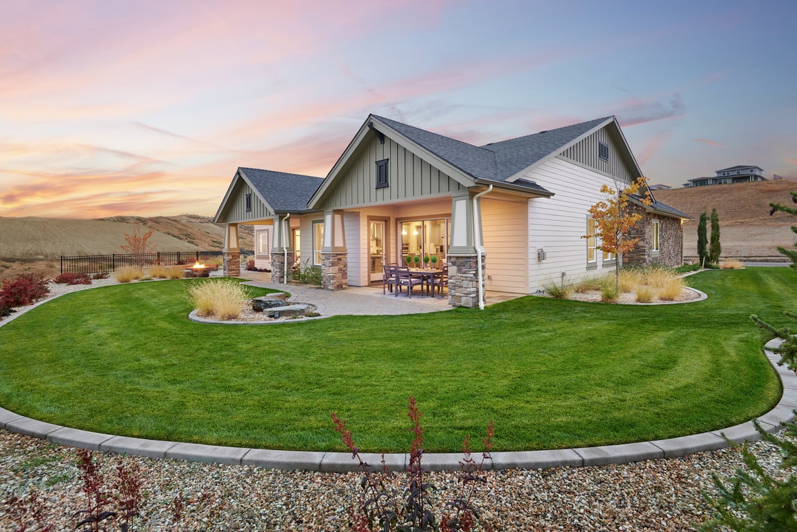 Luxe backyard of Bennett home design, a model found at The Oaks North