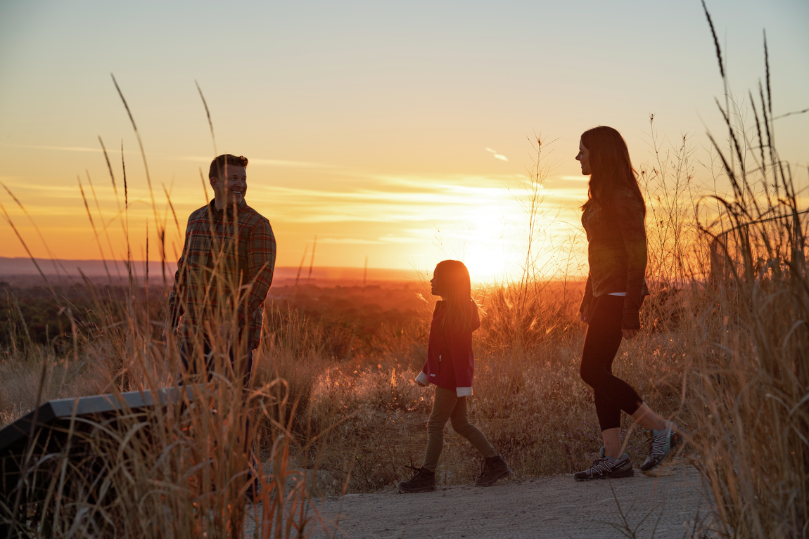 Family hiking and enjoying surrounding environment of The Oaks North