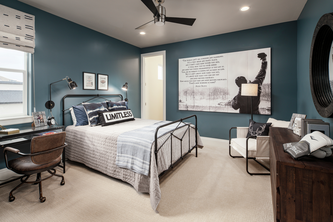 Boys bedroom featuring blue paint color