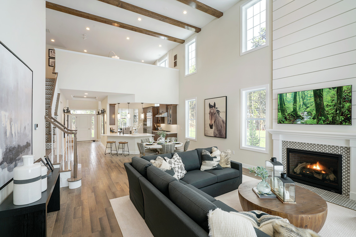 two-story great room full of charm and shiplap design