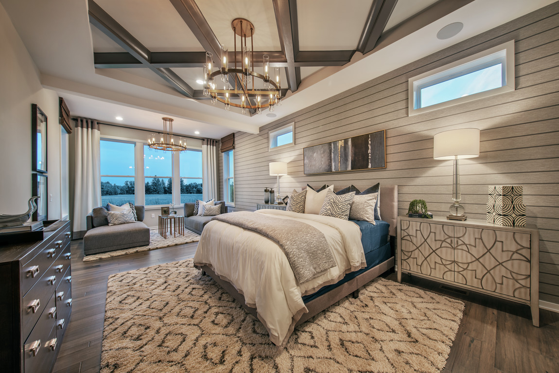 traditional bedroom design with wood beams