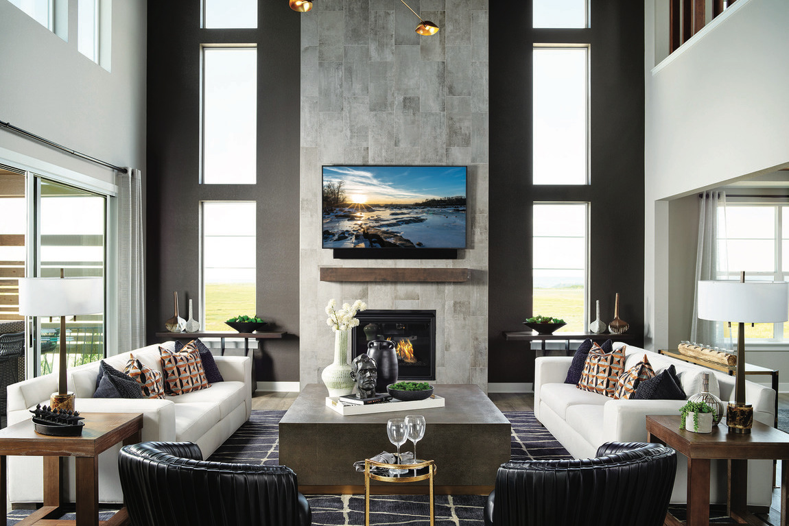 Great living room with floor to ceiling two-story fireplace