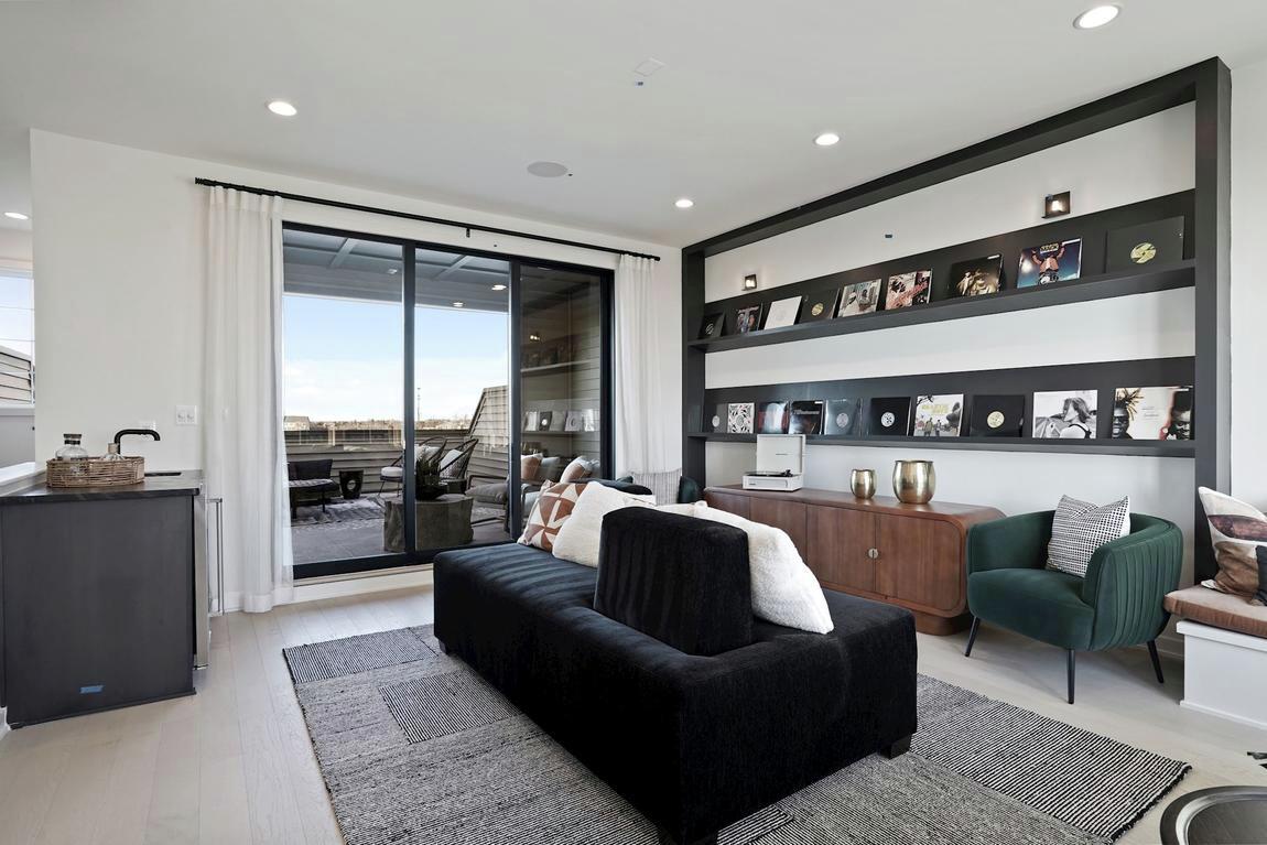 loft with shelving space and outdoor transition to deck