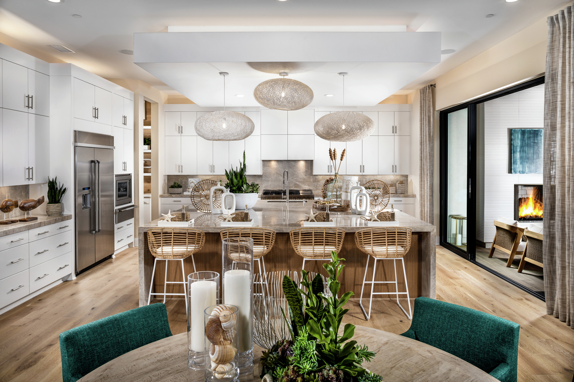 Wicker furniture is functional for both indoor and outdoor use, creating a unique design element for kitchens and rooms beyond.