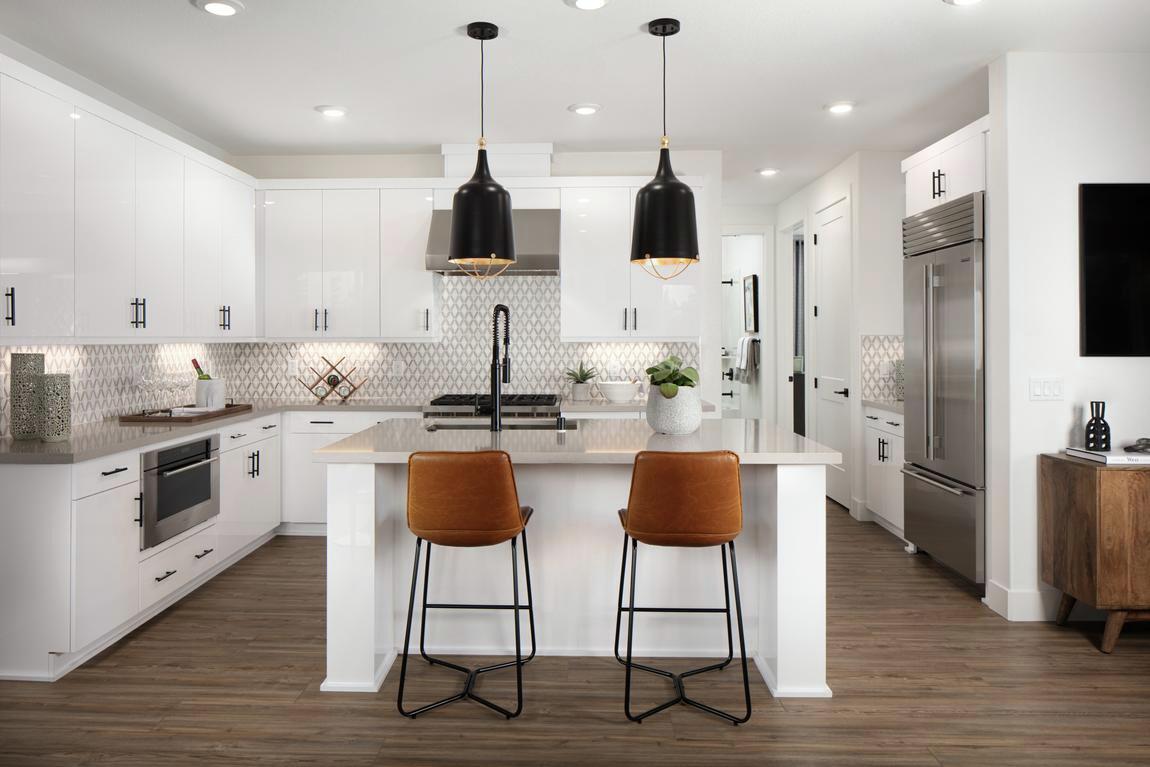Functional kitchen with decorative mosaic tile design