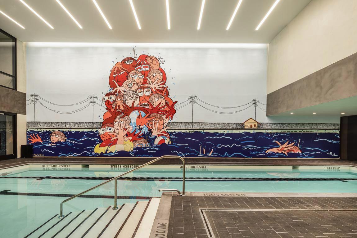 Toll Brothers City Living pool area highlighted by wall art