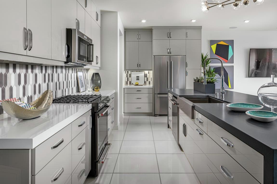 Airy kitchen with large format tile flooring, one of the most popular tile styles