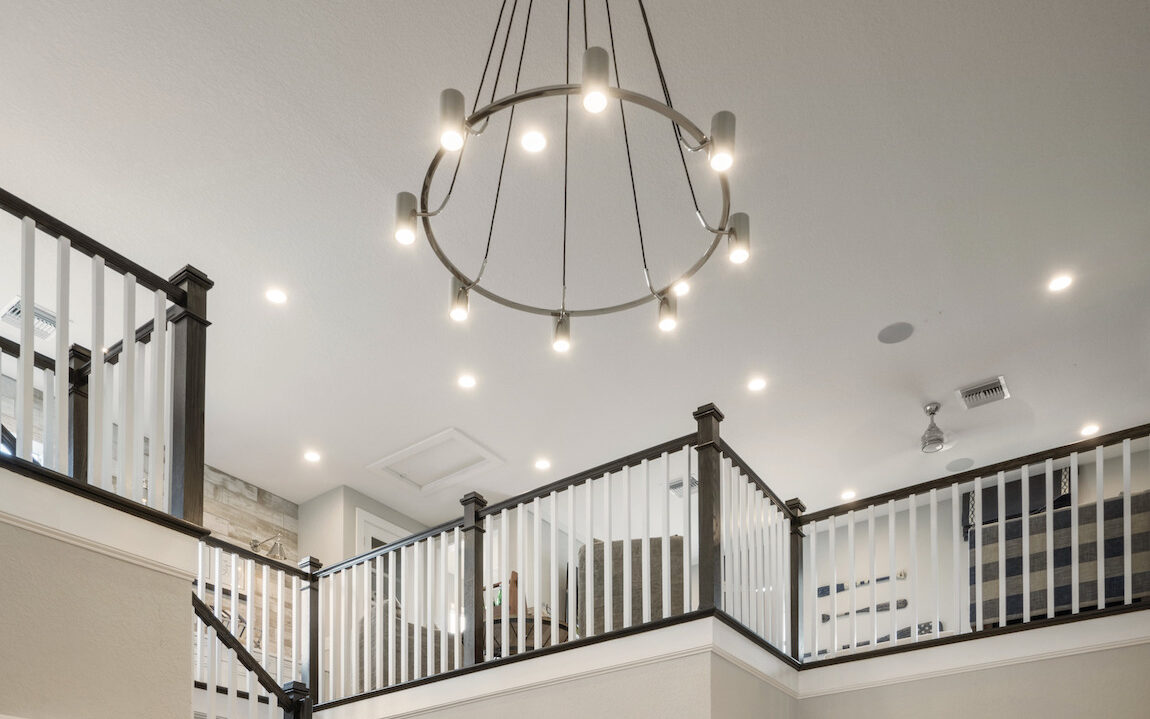 Modern metal chandelier in the foyer