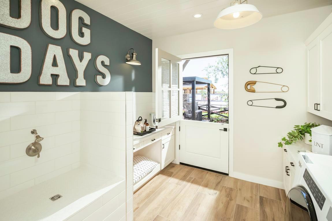 Awesome transitional space highlighted by its pet shower and bed design