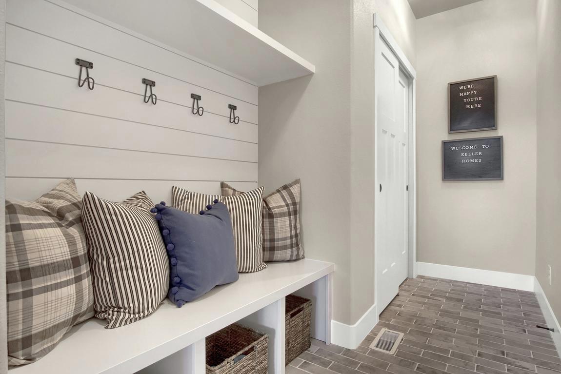comfy mudroom design featuring throw pillows