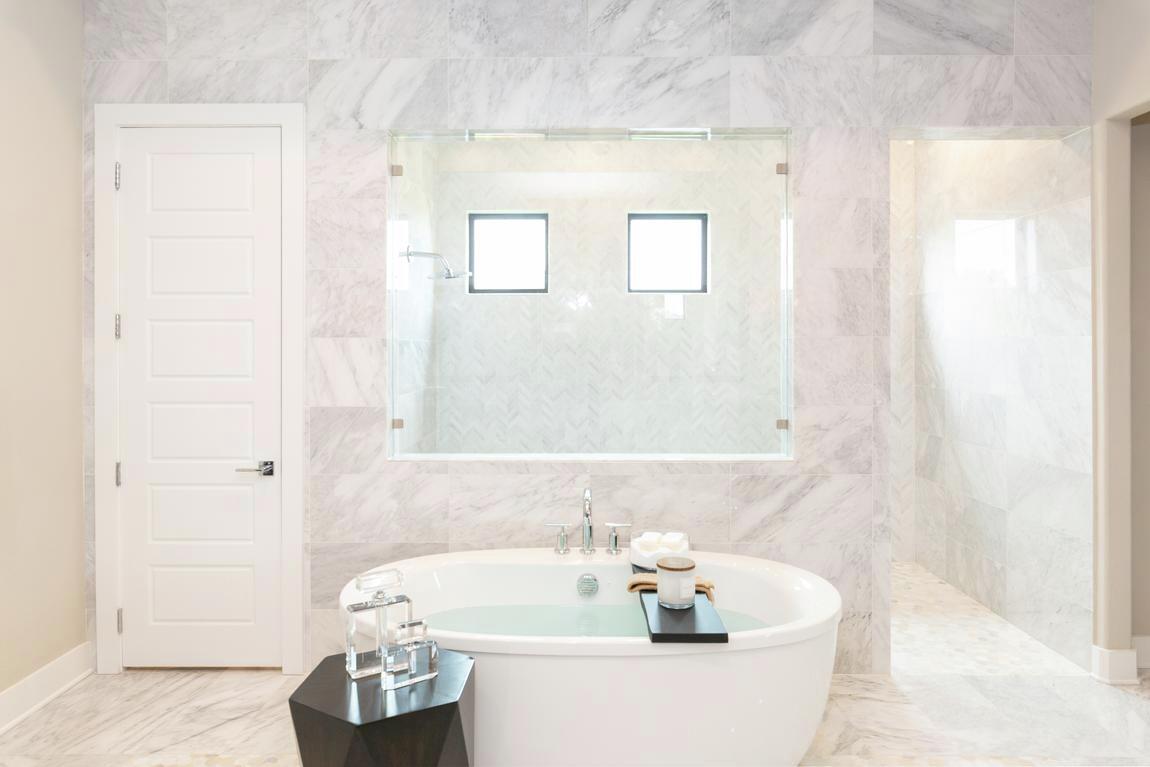 white bathroom design with wet room
