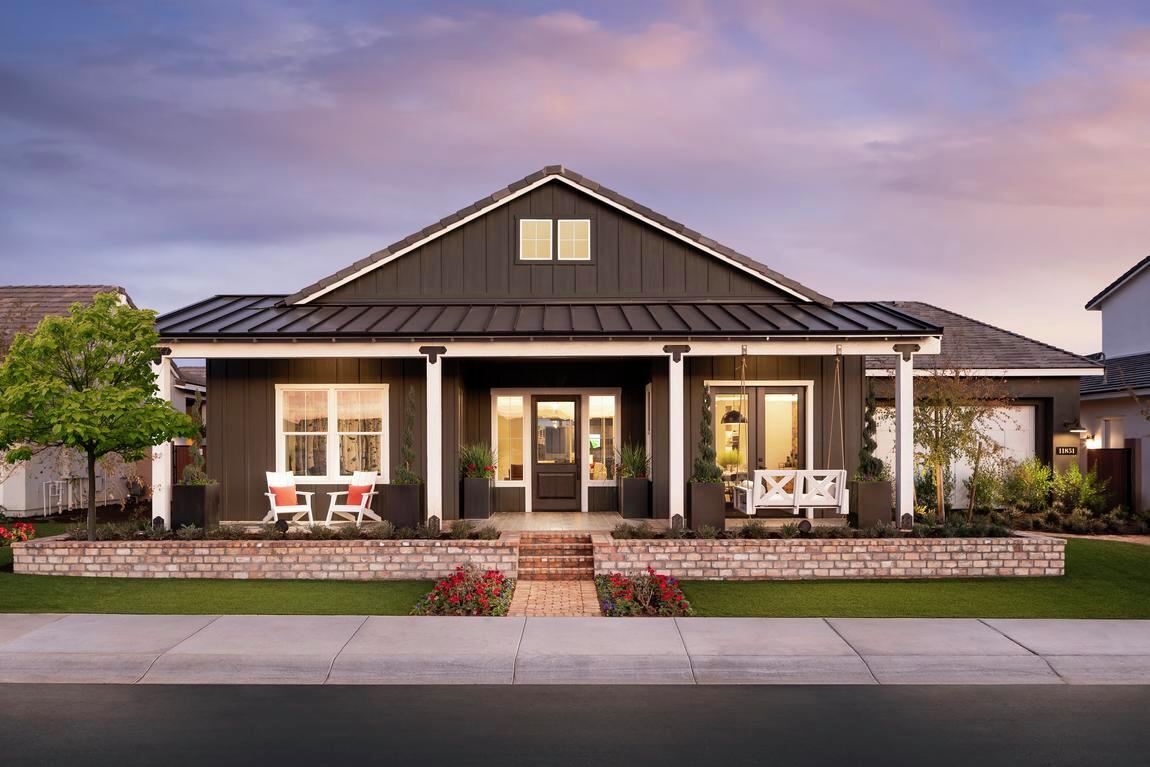 modern farmhouse porch with swinging seats