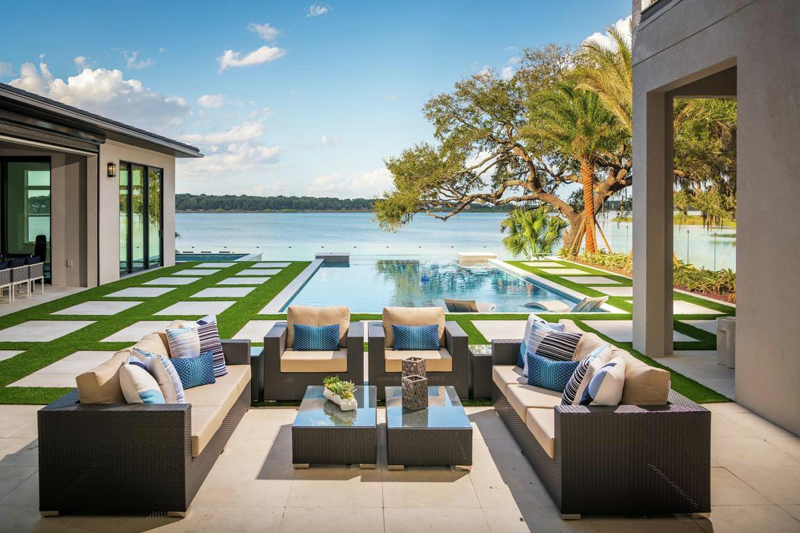 outdoor living space with pool and spectacular waterfront view