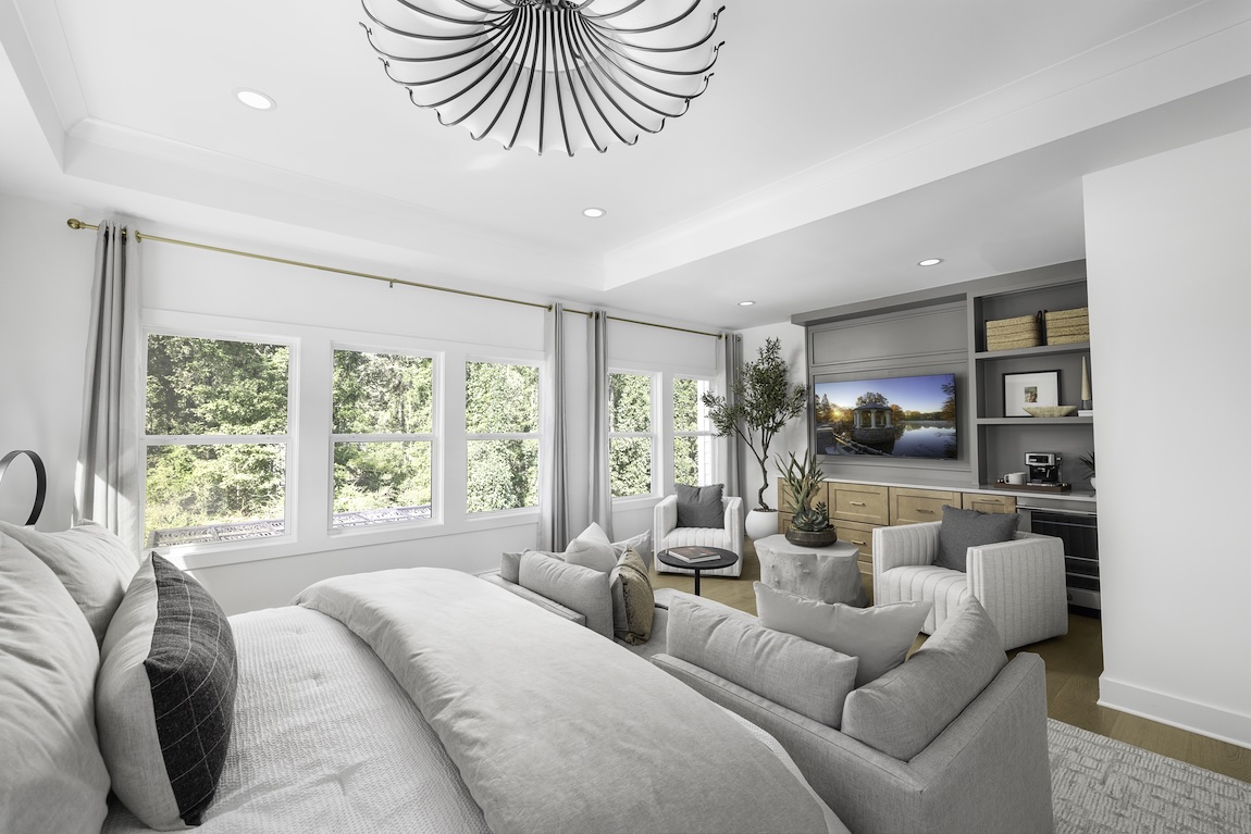 primary bedroom with coffee station and seating