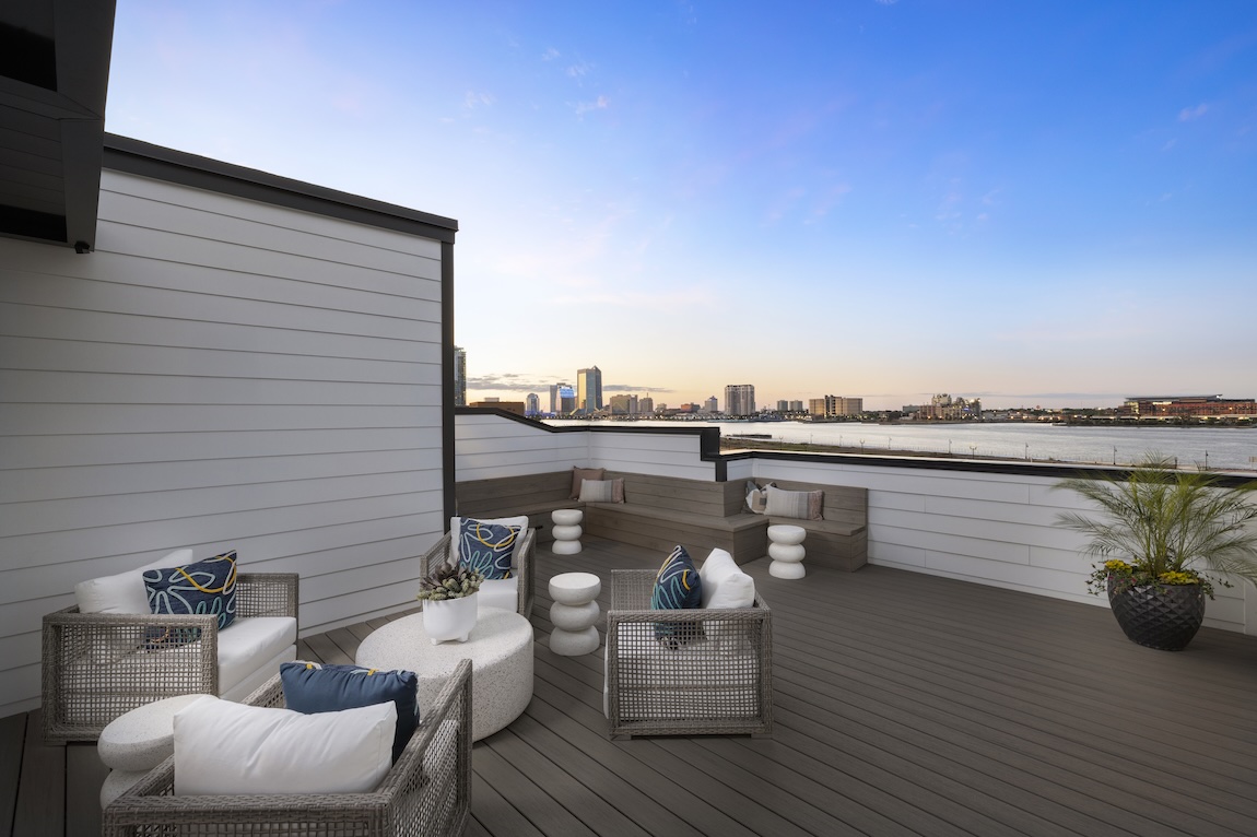 rooftop with seating areas overlooking the river